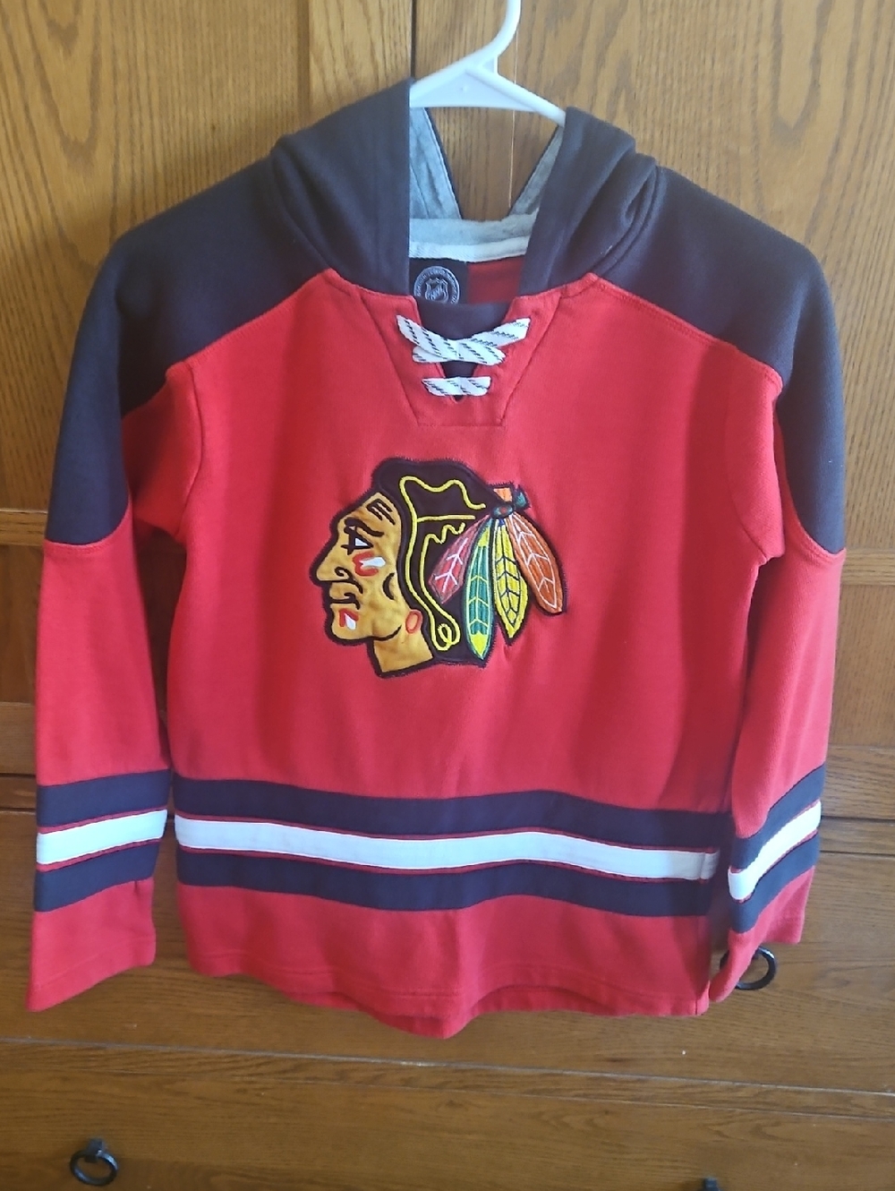 NHL Youth Red and Black Kids Hockey Pullover Hoodie with Team Crest